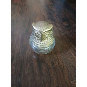 Empty avon owl cologne bottle